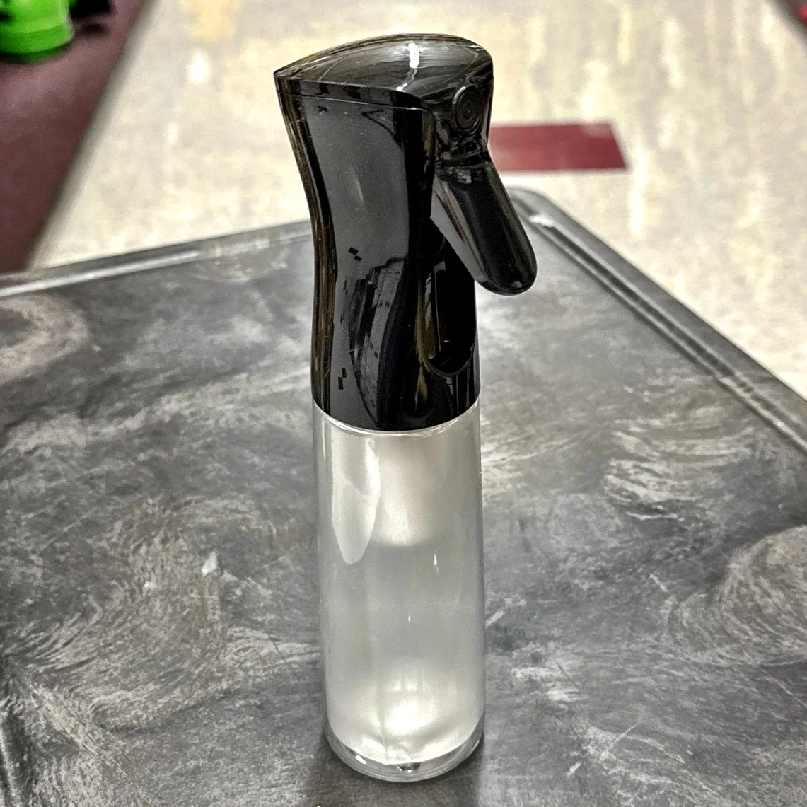 BLACK EZ Mist, a refillable 10oz bottle / sprayer combo that provides an aerosol-type mist without any chemical propellants. - A-Team Window Cleaning